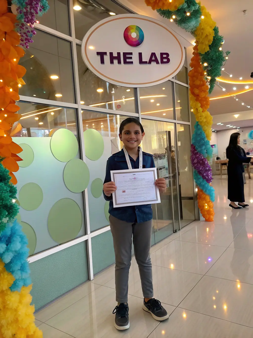 A student receiving a certificate of completion, symbolizing the recognition and validation of their skills acquired at TechBridge Academy.